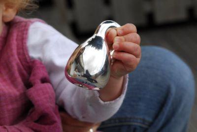 Handcrafted silver baby's rattle based on famous mathematical theory